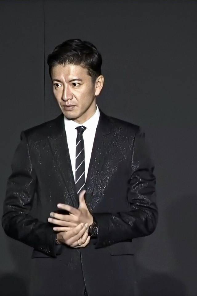 木村拓哉帅气抵沪演绎超模步 自曝私下与罗志祥有联系