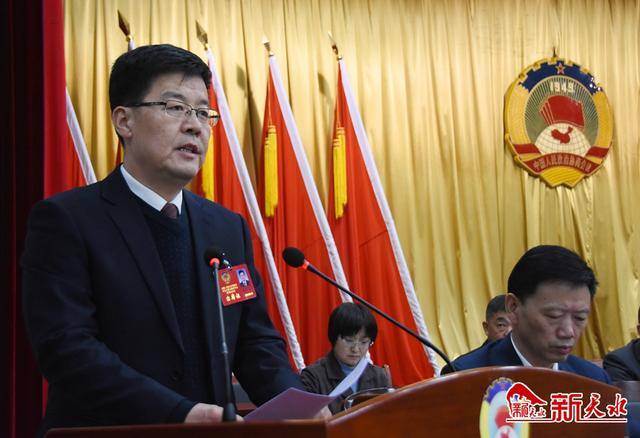 毛更生委员共同参与交通管理创造文明交通环境