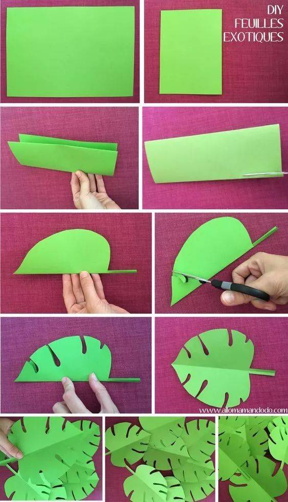 把一张纸对折, 画出半边叶子的形状,用剪刀剪出,一片叶子剪好了,剪几